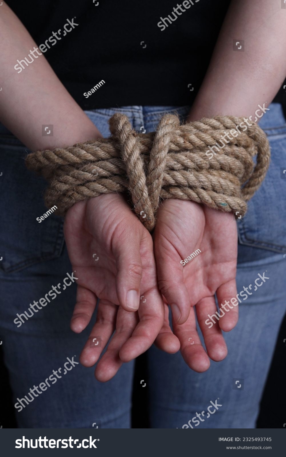 cris colasito add hands tied behind back photo