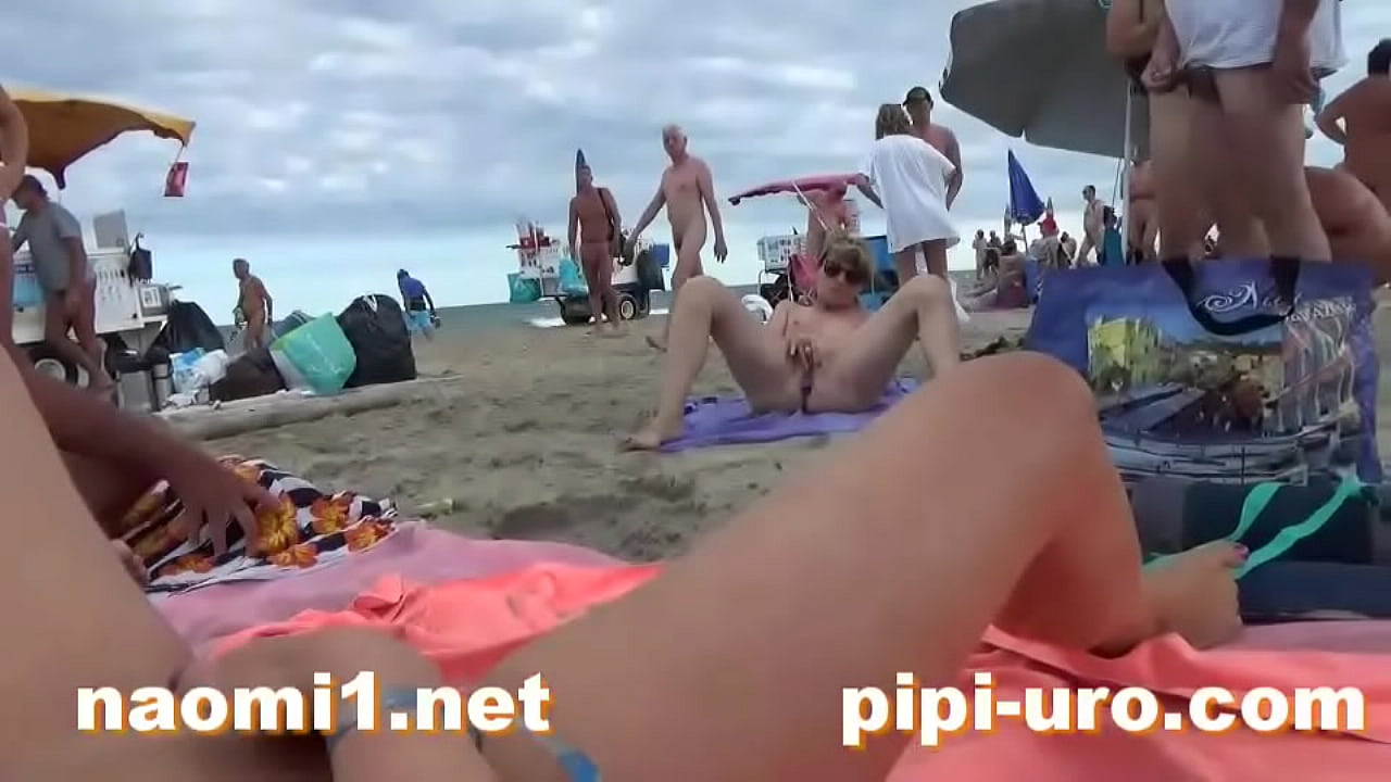 brian larue recommends Woman Masterbates On Beach In The Serf Porn Video American