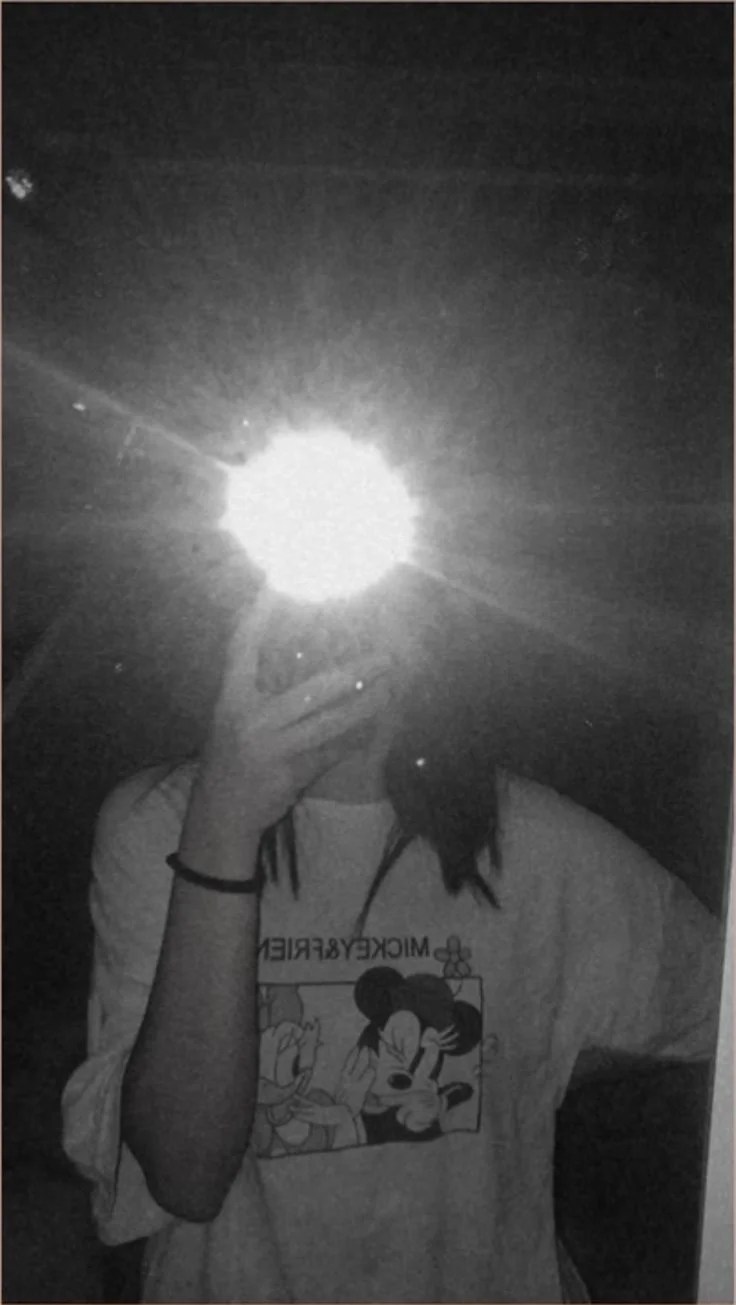 black and white mirror selfie with flash