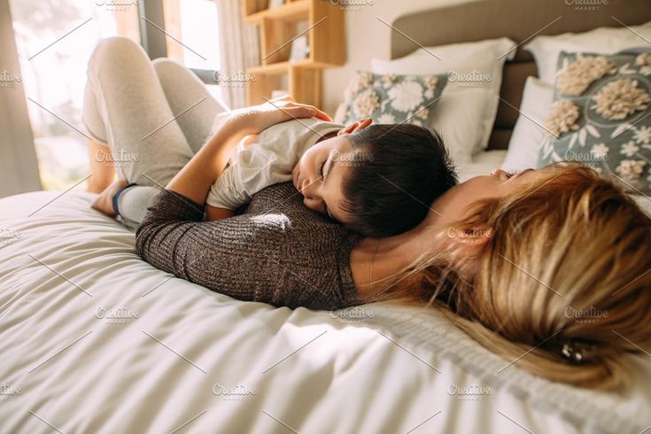 mom and son in bed