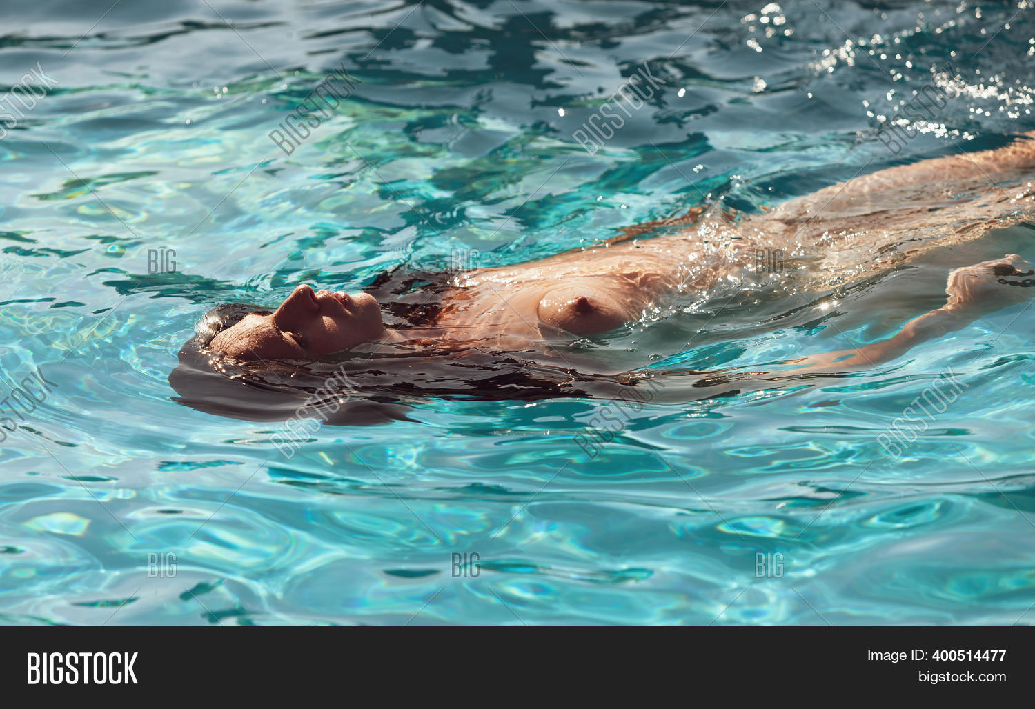 nude woman in pool