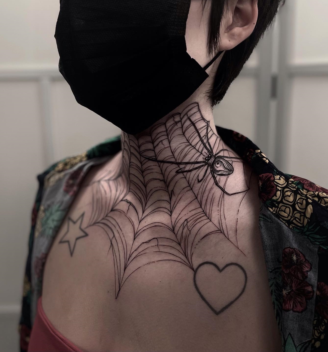 anya johnston recommends spider web throat tattoo pic