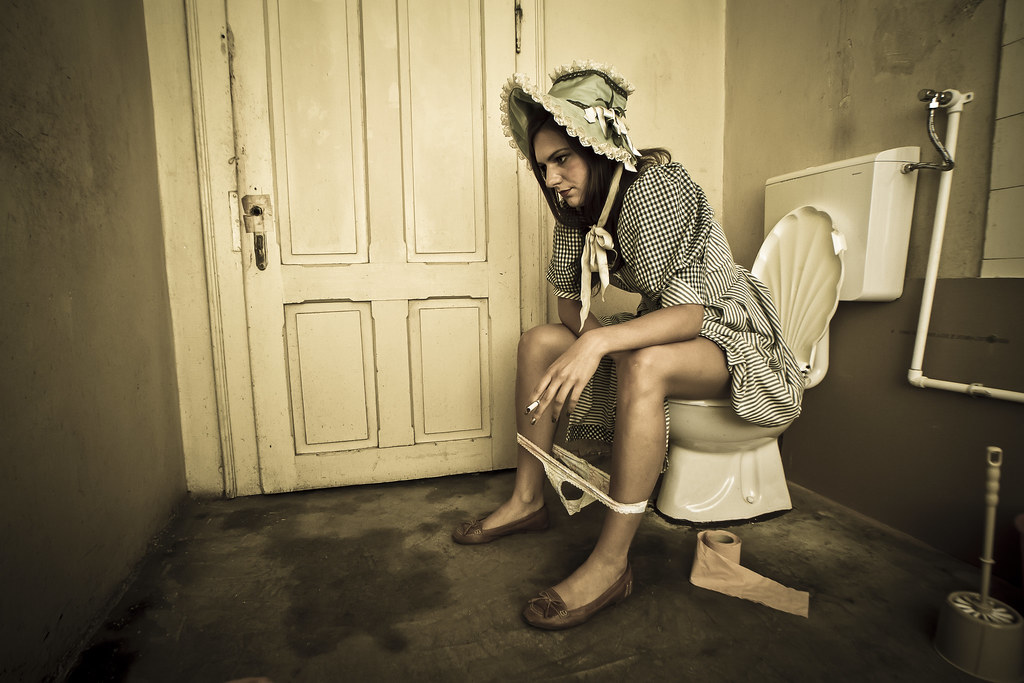 Woman Sitting On The Toilet Pictures tweed heads