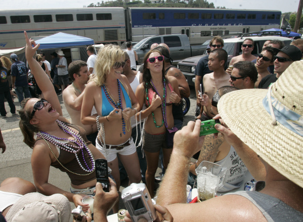 women taking off their bikinis