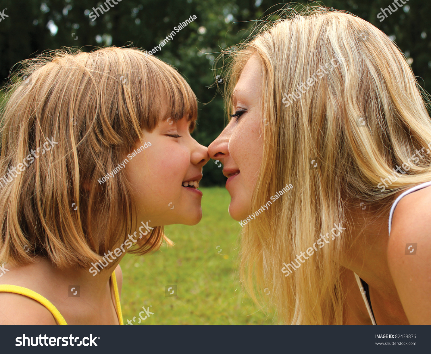 real mother daughter kissing