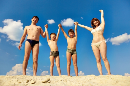 adam kinder recommends nudist beach family photos pic