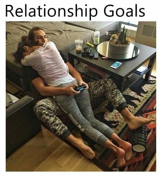 relationship goals couples cuddling while playing video games