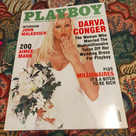 anwar almuslim share darva conger playboy photos