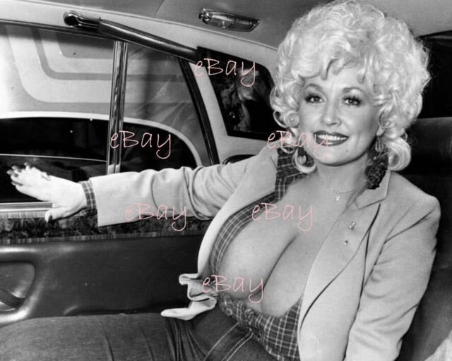 amedeo palazzi add photo dolly parton bare breasts