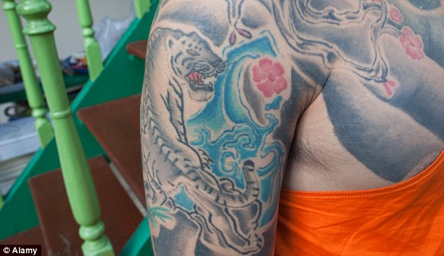 dragon tatto on penis