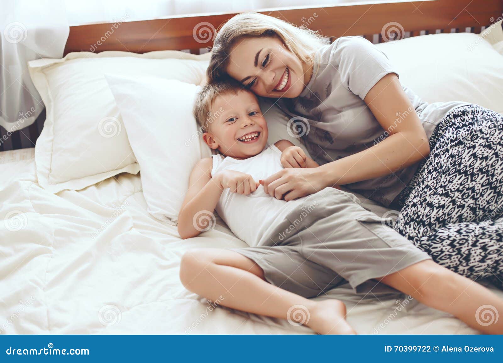 dawn case recommends mom and son in bed pic