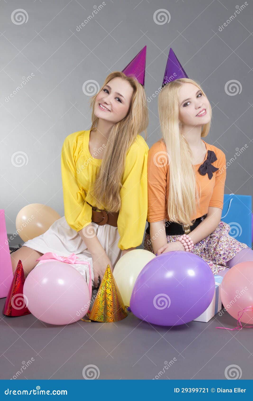 Best of Girl sits on balloons