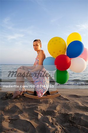 anna maria cassar recommends girl sits on balloons pic