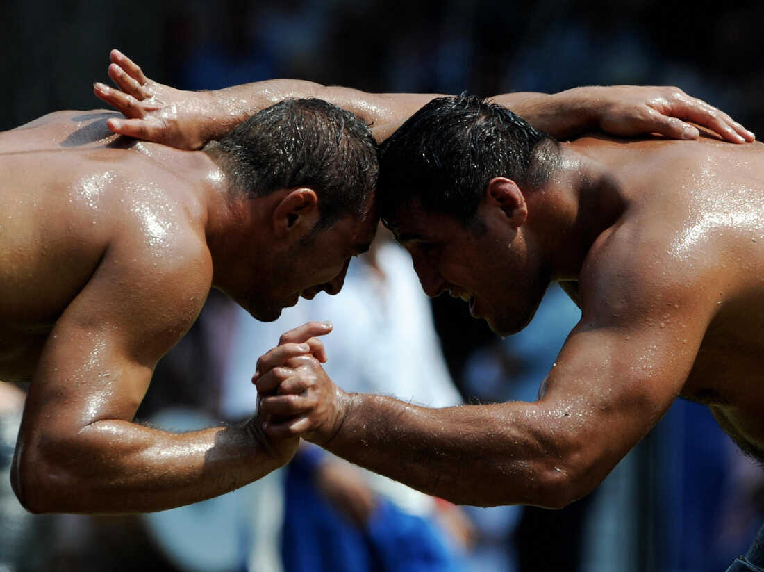 abdullah abdul latiff add mixed oil wrestling photo