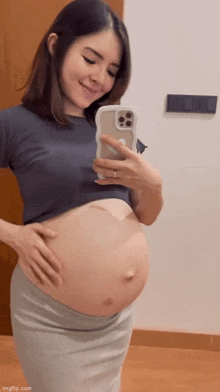 claire ohare recommends pregnant belly gif pic